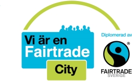 Logotype fairtrade city, grönt och turkos
